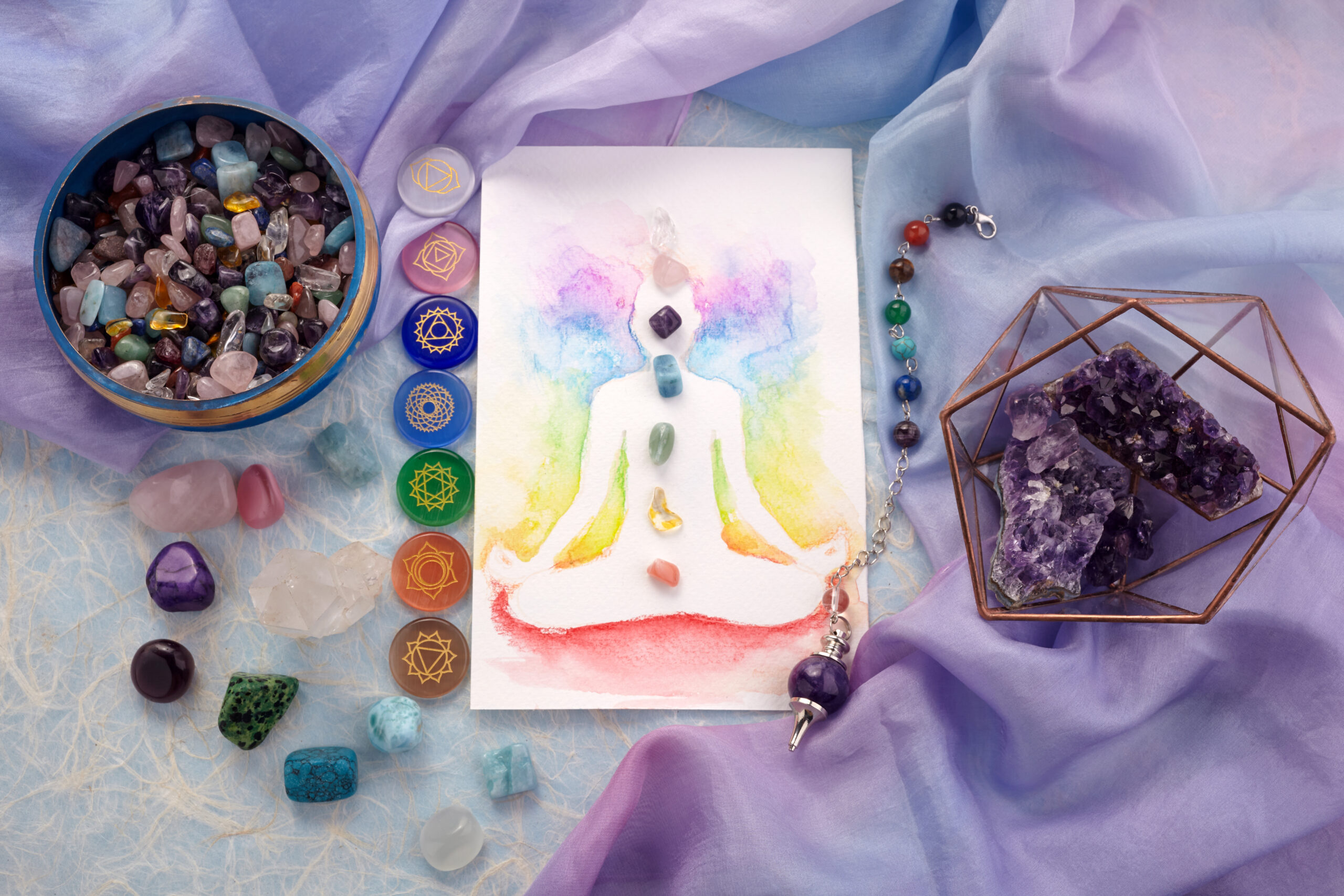 Natural,Crystals,And,Pendulum,On,Pastel,Silk,Background.,Reiki,Background